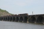 NS 7671 and 9837 take a manifest freight over Rockville Bridge